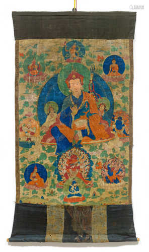 A THANGKA OF PADMASAMBHAVA WITH HIS TWO WIVES.