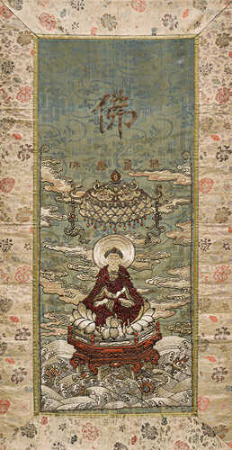 A SILK APPLIQUÉ THANKA OF A BUDDHA.