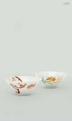 A rare pair of Chinese porcelain anhua and famille rose bowls, Hongzhi marks, Yongzheng period, one painted with a blossoming, gnarled prunus tree, issuing from the footrim and extending to the inside of the bowl, the other with a flowering yellow lily and a sprig of cherry blossom, to the inside with flowering peony and an orchid sprig, each with flared sides anhua decorated with two confronting dragons and a flaming pearl, underglaze blue six-character Hongzhi mark within a double circle, 9.7c