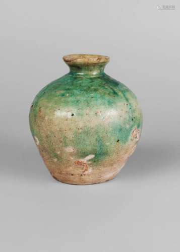 A Chinese monochrome stoneware vase, Ming dynasty, 16th century, with pale translucent turquoise glaze and flared mouth, flat unglazed base, 12cm high