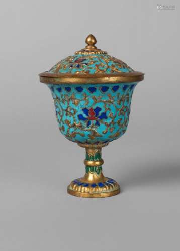 A Chinese gilt bronze champleve enamel cup and cover, 19th century, decorated with lotus blooms and foliate scrolls on a turquoise ground, 13.5cm high
