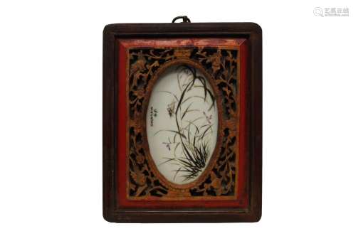 A Chinese porcelain famille rose plaque in the manner of Ming Liang, Republic period, dated 1937, painted with a cricket amidst flowering grass, bears seal mark and artist's colophon to left, in pierced hardwood frame, 31cm x 25cm (total)