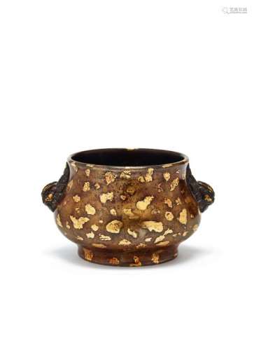 A Chinese bronze gold splash censer, Xuande mark, 18th century, of bombe form, with lion mask handles, recessed base, cast with six character mark, 14cm wide, 8cm high, 577 grams Provenance: Private Swedish Collection