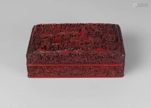 A Chinese cinnabar lacquer rectangular box and cover, late Qing dynasty, the cover profusely carved in deep relief with figures in a village landscape, the sides carved with lotus blooms, 20cm wide