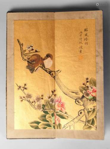 20th century Chines School, a folding of six gouache on gold paper, studies of various birds amidst flowers, each interspersed with a colophon, ea. 44cm x 33cm