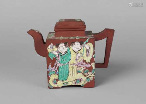 A Chinese Yixing enamelled square teapot, late Qing dynasty, painted with figures and prunus blossom, impressed flower seal mark to base, 18cm long, 13cm high