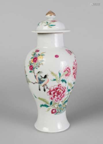 A Chinese export porcelain jar and cover, late 18th/early 19th century, painted in famille rose enamels with birds and butterflies amidst prunus blossom, peony, and chrysanthemum, 27cm high