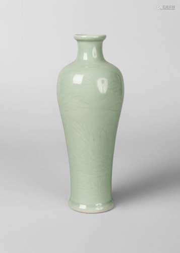 A Chinese porcelain baluster celadon vase, Republic period, of slender elongated form, incised with peony, underglaze blue four character mark to base, 24cm high