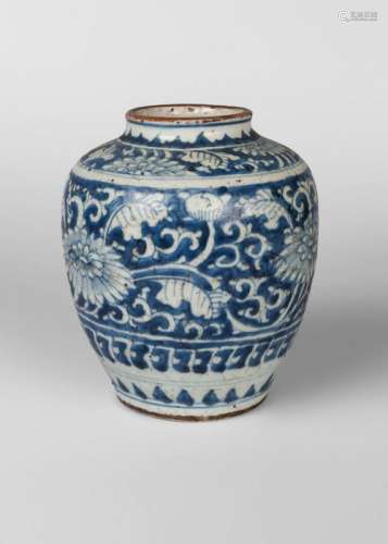 A Chinese porcelain jar, Ming dynasty, 16th century, painted in underglaze blue with chrysanthemum blooms and meandering scrolls, 17cm high
