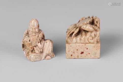 A Chinese soapstone square seal, early 20th century, carved with a crab, 4.5cm wide, and a soapstone carving of Shoulao, 5.5cm high (2)