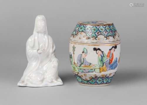 A Chinese Dehua porcelain figure of Guanyin seated, Kangxi period, late 17th century, 10.5cm high, and a 19th century porcelain barrel shaped jar and cover painted in famille verte enamels to the body with a continuous scene depicting figures at court, unmarked, 10cm high (2) Provenance: Distinguished Midlands Collection