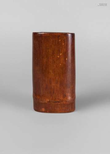 An unusual Chinese bamboo square brush pot, 19th century, of compressed form with rich light patina, 15.5cm high