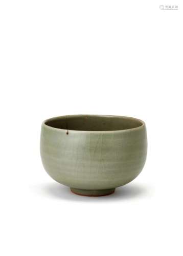 A rare Chinese Longquan celadon alms bowl, Song/Yuan dynasty, with slightly ribbed exterior, 13cm diameter, 8.5cm high Provenance: Private Cambodia Collection
