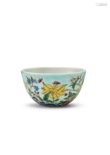 A Chinese porcelain famille rose tea bowl, Qianlong mark, densely painted with chrysanthemum, peony, and orchid, on a turquoise ground, underglaze blue seal mark to base, 4cm high, 7cm diameter