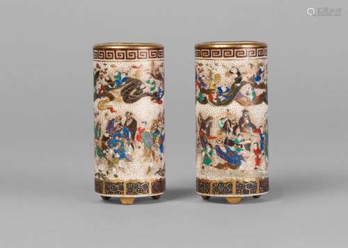 A pair of Japanese miniature Satsuma cylindrical vases, Meiji period, each finely painted with children and deities in a continuous celestial scene on a gold fleck ground, signed, 6cm high