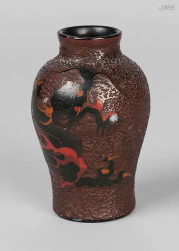 A Japanese lacquered porcelain baluster vase, late 19th century, finely decorated with a dragon on a textured ground, gilt signature to base, 10cm high