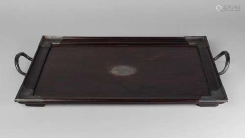 A Chinese huali wood and silver mounted twin-handled tray, c.1925, of rectangular form, with simulated bamboo handles and silver presentation plaque inscribed ' Presented to Mr W Taylor By Members of Kowloon Dock Staff on the Occasion of his Retirement 17th April 1925, 61cm x 37cm
