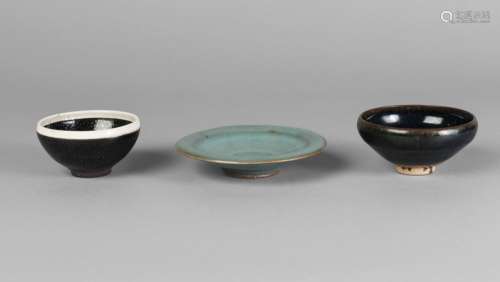 Three Chinese Song/Yuan style bowls, 20th century, comprising a Chinese cizhou-type russet-splashed bowl, 9cm diameter, a jun-style shallow bowl, 12cm diameter, and a oil-spot bowl, 8cm diameter (3)