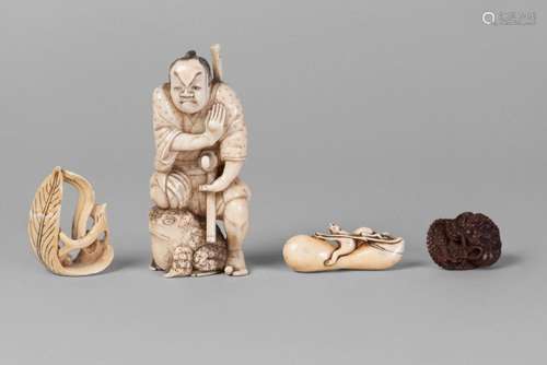 A Japanese ivory okimono and three netsuke, late 19th-early 20th century, comprising okimono carved as a samurai kneeling on a toad, 12cm high, a boxwood netsuke carved as a coiled dragon, 4cm long, and two ivory netsuke carved as monkeys on a gourd and a man seated on a leaf (4)