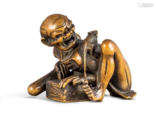 NETSUKE: RATTENFÄNGER. Japan. Edo-Zeit. 19. Jh. Buchsbaum, sehr fein geschnitzt und graviert, die