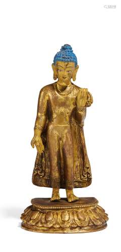 STEHENDER BUDDHA SHAKYAMUNI. Tibet. 18./19. Jh. Kupferbronze, feuervergoldet und mit Kaltgold- und