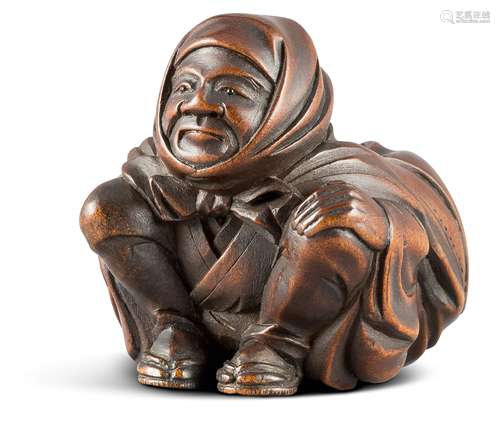 NETSUKE: YAKUHARAI. Japan. Edo-Zeit. Buchsbaum mit fein geschnitzten Details. Die Augen des Jägers