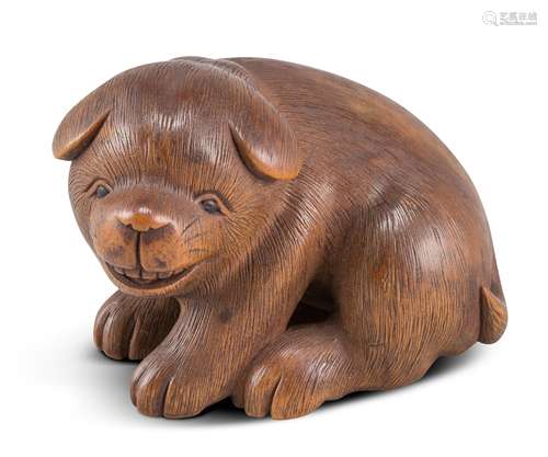 NETSUKE: SITZENDER WELPE. Japan. Edo-Zeit. Mitte 19. Jh. Buchsbaum, fein geschnitzt und graviert,