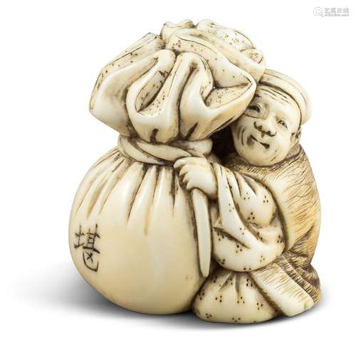 NETSUKE: KANNINBUKURO. Japan. Edo-Zeit. Mitte 19. Jh. Elfenbein mit fein geschnitzten, gravierten