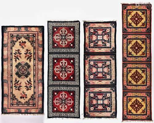 A group of four Chinese rugs