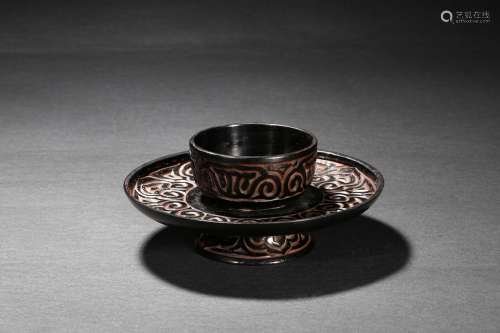 A Tixi black lacquer cup stand