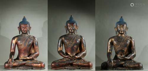 A set of three large gilt-painted bronze bodhisattva