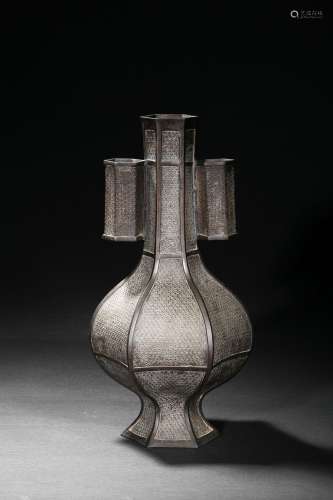 A bronze hexagonal vase