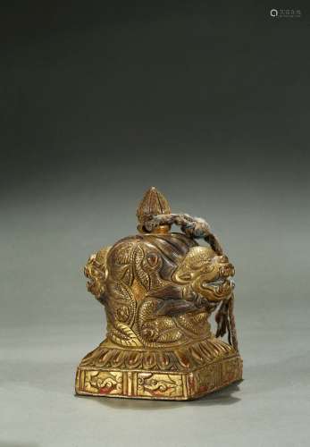 A Tibetan gilt bronze mythical beast seal
