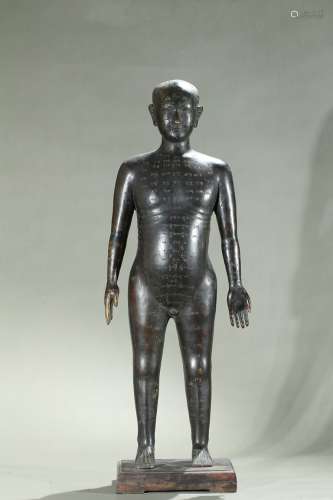 A large bronze standing acupuncture figure