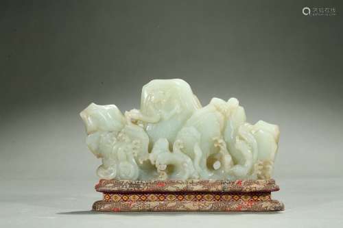 A white jade 'dragon' brushrest