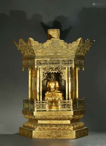 A large and rare gilt-bronze buddhist shrine and buddha figure