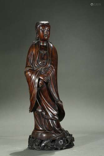 An agarwood carved guanyin figure