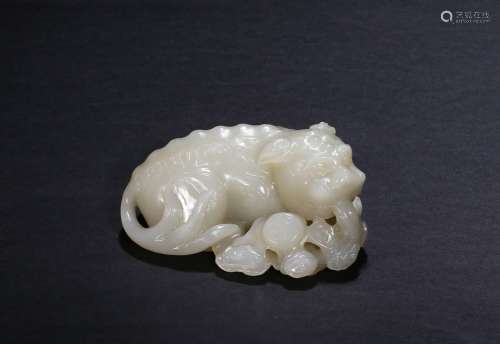 A white jade mythical beast paperweight