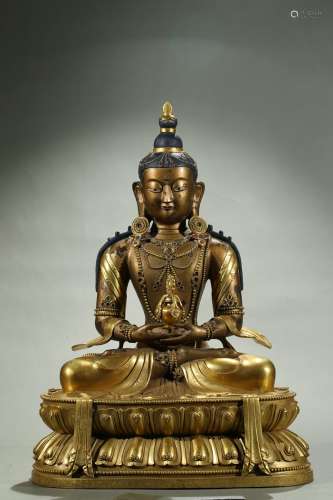 A large gilt-bronze figure of amitayus