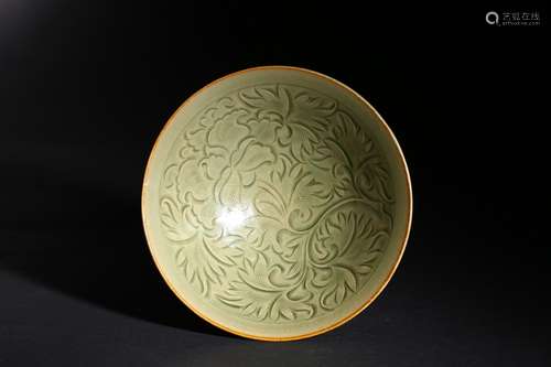 A carved Yaozhou celadon glazed bowl