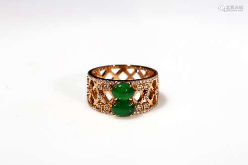 A glassy jadeite diamond ring
