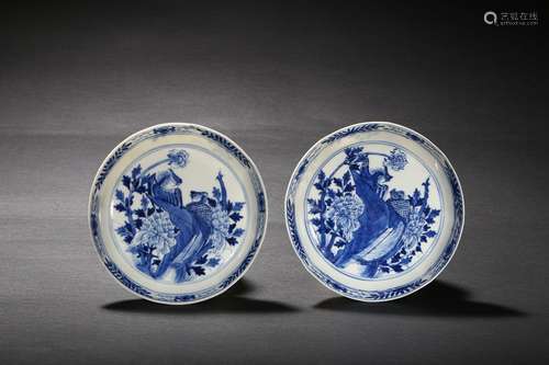 A pair of blue and white 'phoenix' dishes