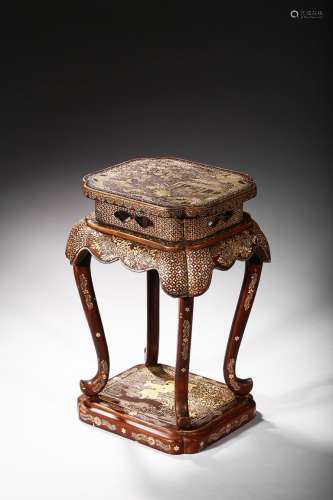 A mother of pearl inlaid lacquer stand