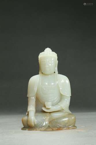 A white jade carving of shakyamuni