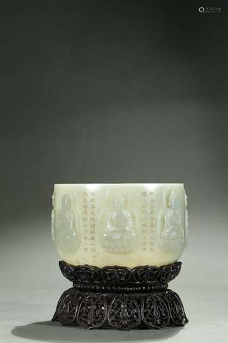 A white jade 'buddha and inscription' bowl