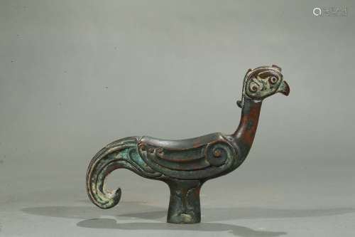 An archaistic bronze bird-form finial