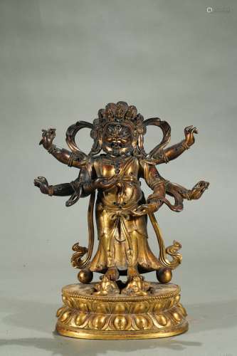 A gilt-bronze six-armed bodhisattva