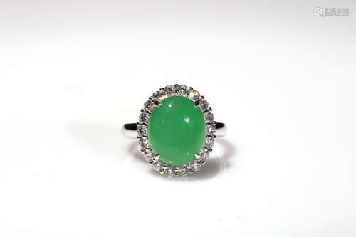 A icry apple green jadeite diamond ring