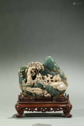 A green jade carved 'figures' boulder