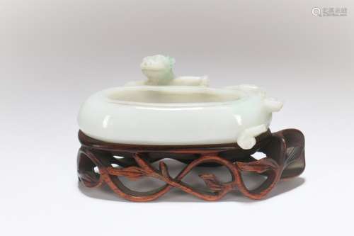 A Chinese Carved Jade Water Pot with Stand